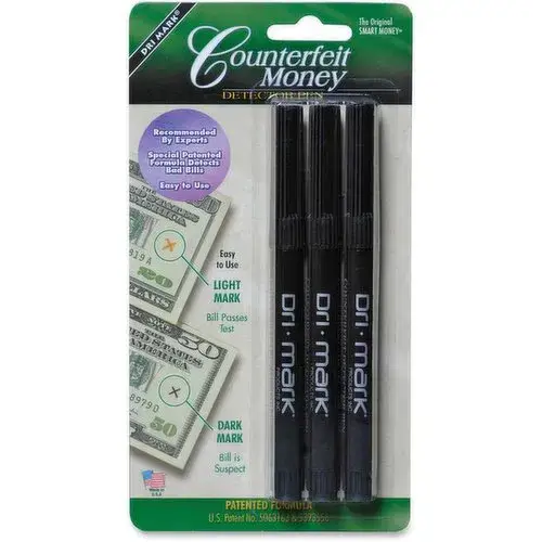 A counterfeit detector pen next to a stack of cash.