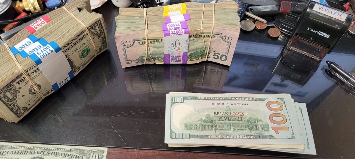High-quality counterfeit dollar bills for sale.