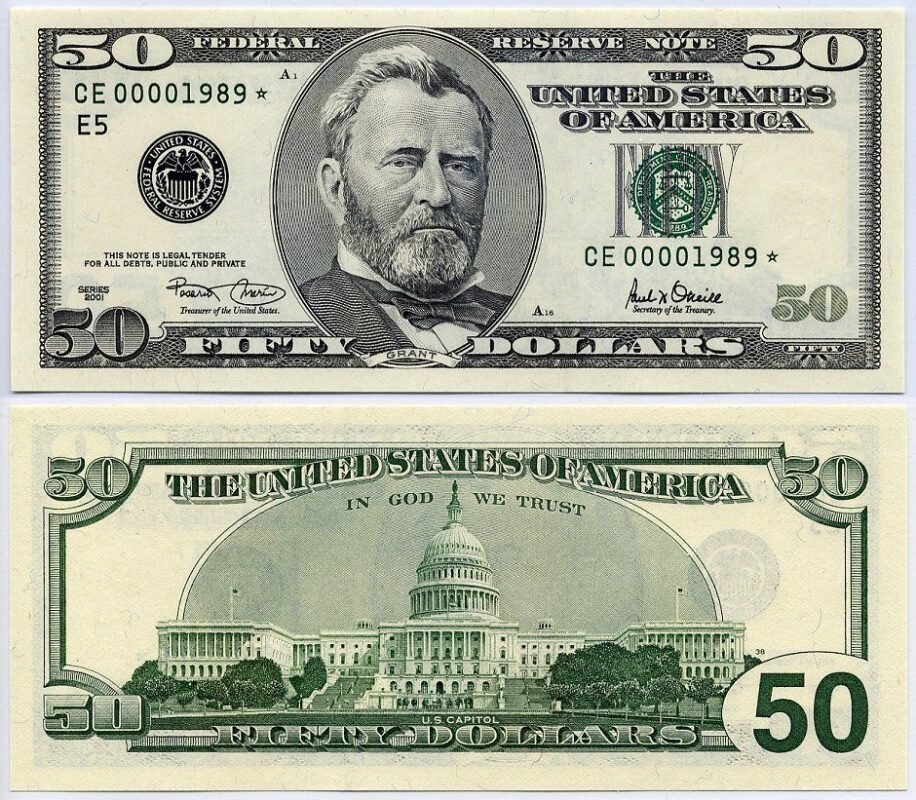 Undetectable counterfeit $50 bills arranged in a fan pattern for online money scheme
