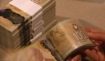 Counterfeit Canadian currency with visible security features including the transparent window and metallic portrait.