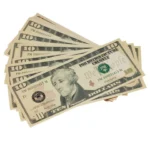 Shop close-up $10 fake bill – modern blue-stripe detail visible